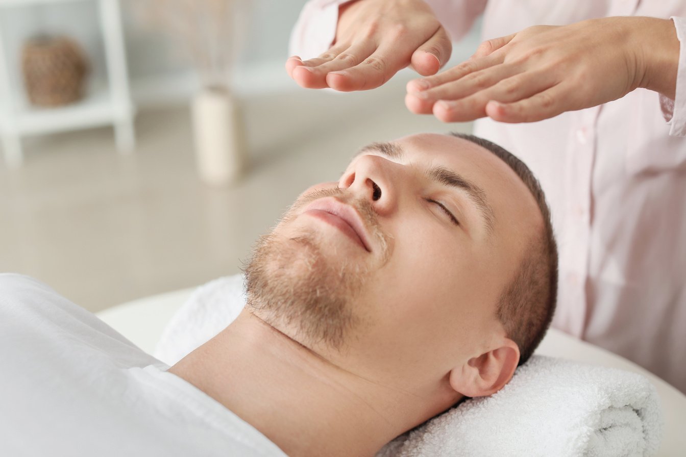 Reiki Master Working with Patient